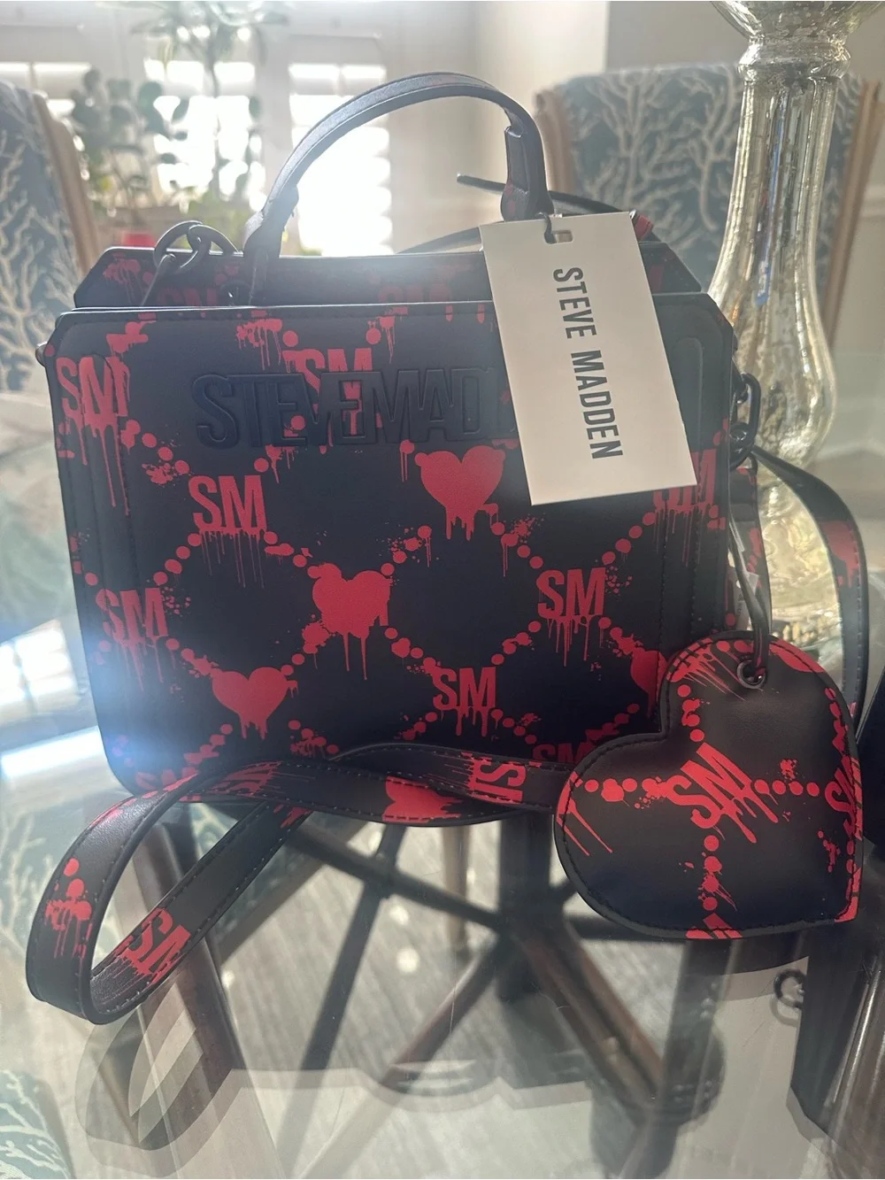 Steve Madden Black and Red Graphic Messenger Bag with Heart Charm